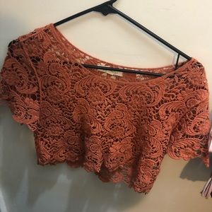 Orange lace crop top